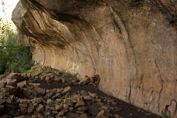 Cliff overhang with the cave paintings
